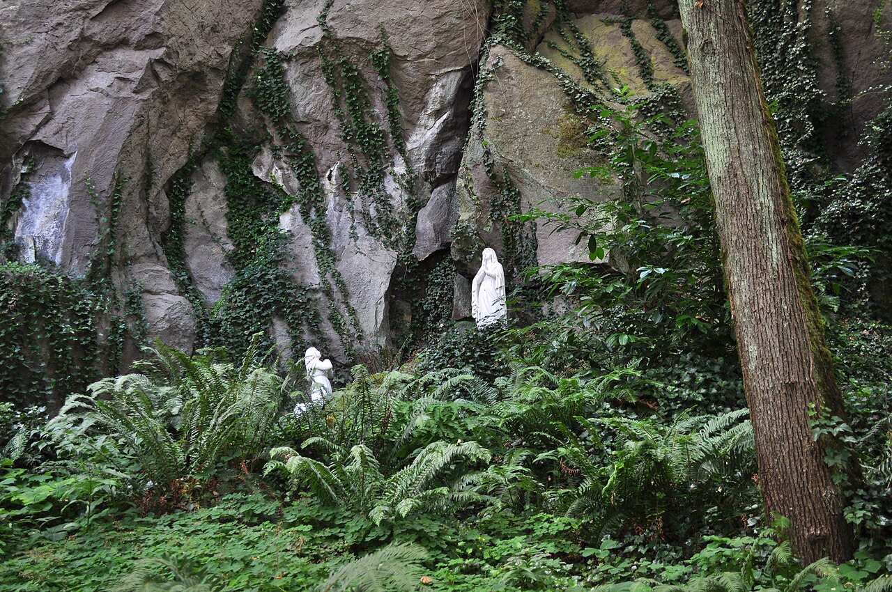 Garden paths and greenery beneath the cliff at The Grotto in Portland